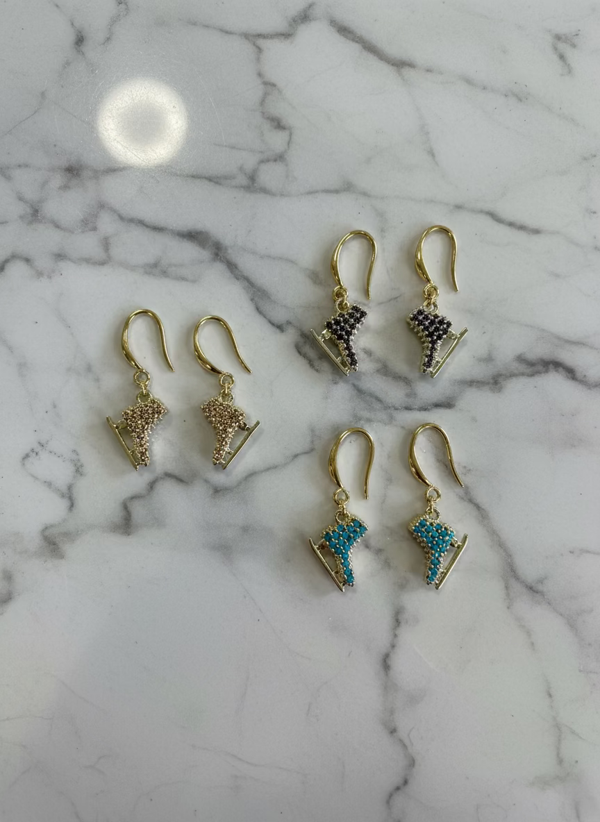 Boucles d'oreilles de patinage sur glace